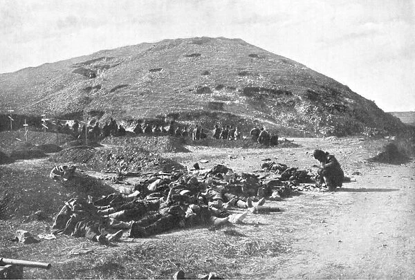 Russian soldiers collecting cartridges from the dead before burial, Russo-Japanese War 1904-5