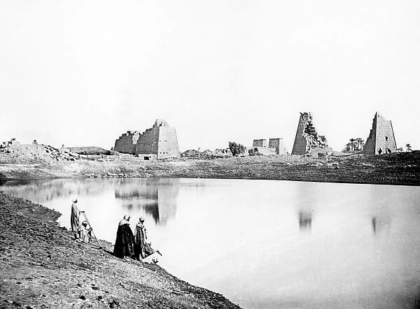 Sacred Lake and temple ruins, Karnak, Nubia, Egypt, 1887. Artist: Henri Bechard