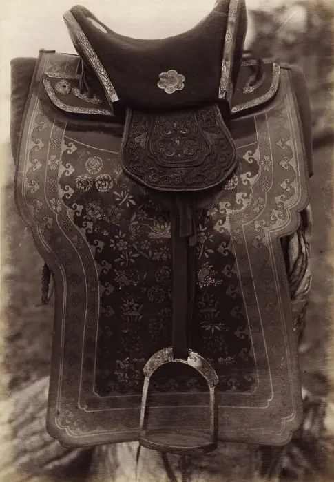 Framed Print : Saddle with Chinese Saddle-Cloth and Silver Mongolia Engraving over Iron, 1897. Creator: Unknown