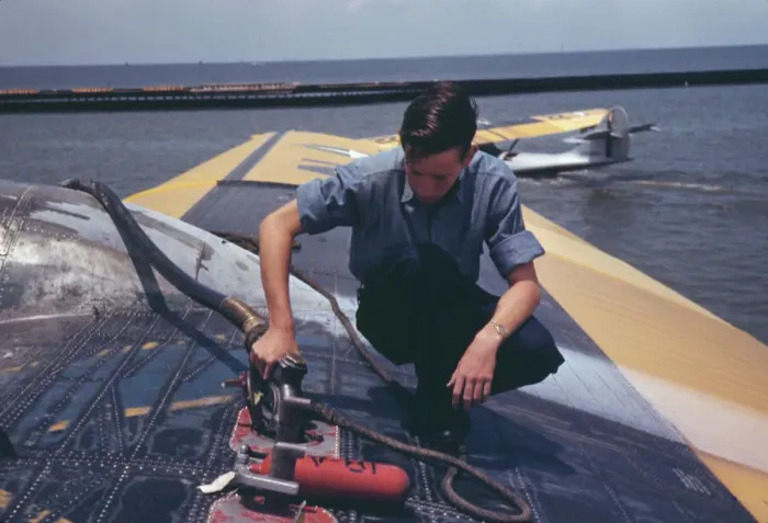 Framed Print : A sailor mechanic refueling a plane at the Naval Air Base, Corpus Christi, Texas, 1942. Creator: Howard Hollem Framed Print : A sailor mechanic refueling a plane at the Naval Air Base, Corpus Christi, Texas, 1942. Creator: Howard Hollem