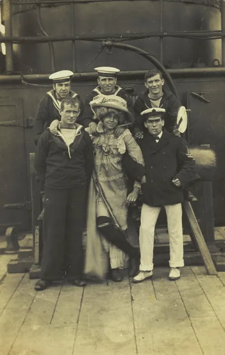 Framed Print : Six sailors, one in drag, pose for a group portrait on the deck of HMS St...(between 1910 and 1919?) Creator: Unknown Framed Print : Six sailors, one in drag, pose for a group portrait on the deck of HMS St...(between 1910 and 1919?) Creator: Unknown