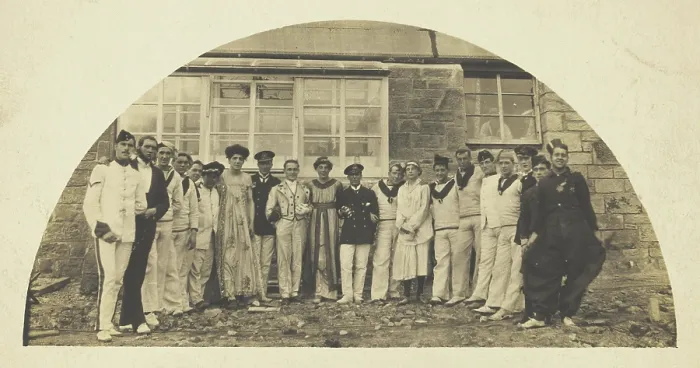 Framed Print : Sailors with men in drag outside a building, [between 1910 and 1919?]. Creator: Unknown