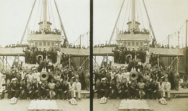 Sailors, probably American, and some civilians posed on a cruiser berthed in New York(?), c1905. Creator: Underwood & Underwood. Sailors, probably American, and some civilians posed on a cruiser berthed in New York(?), c1905