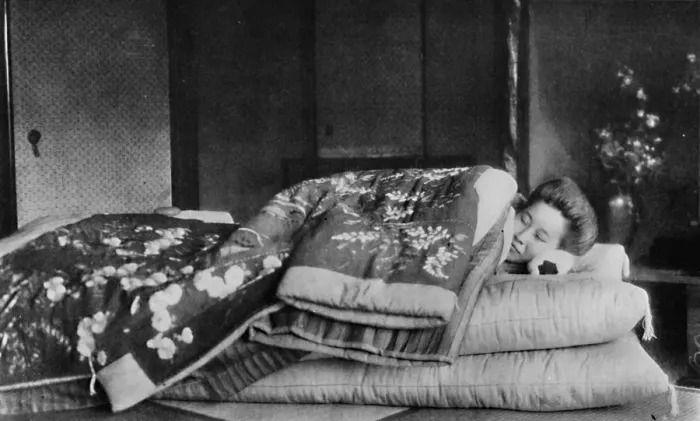 Framed Print : Saki, the housekeeper sleeps on a mattress with hard pillow under a quilted kimono, c1900, (1921). Artist: Julian Leonard Street Framed Print : Saki, the housekeeper sleeps on a mattress with hard pillow under a quilted kimono, c1900, (1921). Artist: Julian Leonard Street