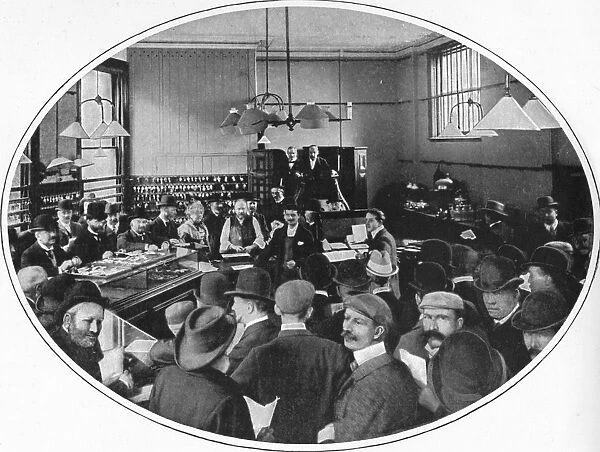 Sale of unredeemed goods at Debenham, Storr and Sons auction rooms, London, c1903 (1903)