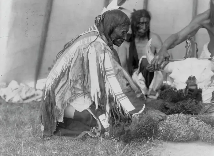 Framed Print : Saliva, Slow Bull (in background), Picket Pin's arm, c1907. Creator: Edward Sheriff Curtis Framed Print : Saliva, Slow Bull (in background), Picket Pin's arm, c1907. Creator: Edward Sheriff Curtis