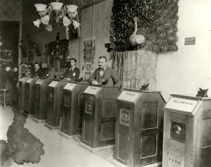 Framed Print : San Francisco Parlor with Kinetoscopes, 1894-1895. Artist: Anonymous Framed Print : San Francisco Parlor with Kinetoscopes, 1894-1895. Artist: Anonymous