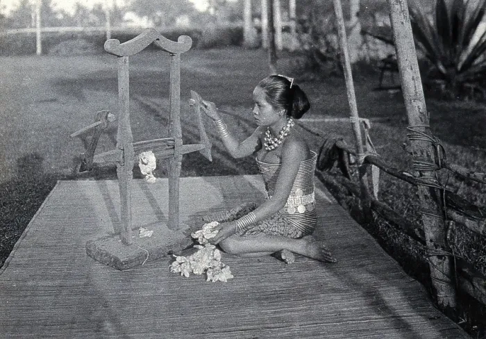 Framed Print : Sarawak: a girl extracting the seeds of raw cotton in a cotton gin, c1900. Creator: Unknown Framed Print : Sarawak: a girl extracting the seeds of raw cotton in a cotton gin, c1900. Creator: Unknown