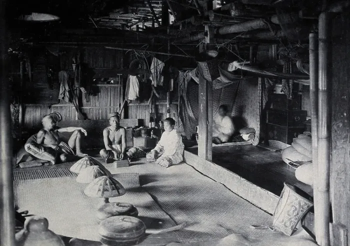 Framed Print : Sarawak: interior of a Kadayan tribal house, with a meal laid out, c1900. Creator: Unknown