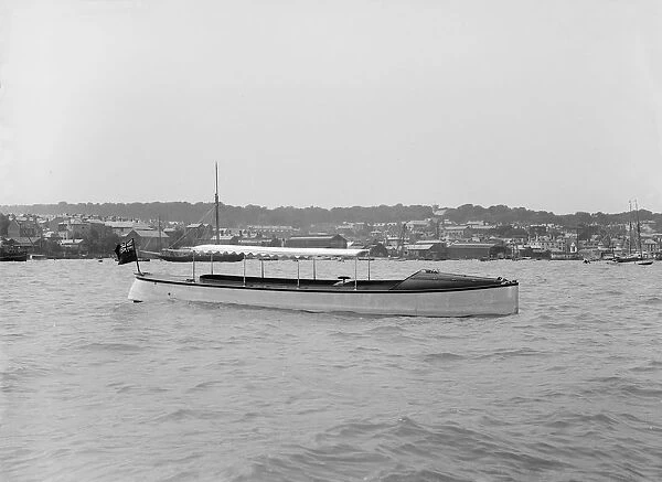 Saunders motor launch at anchor, 1914. Creator: Kirk & Sons of Cowes