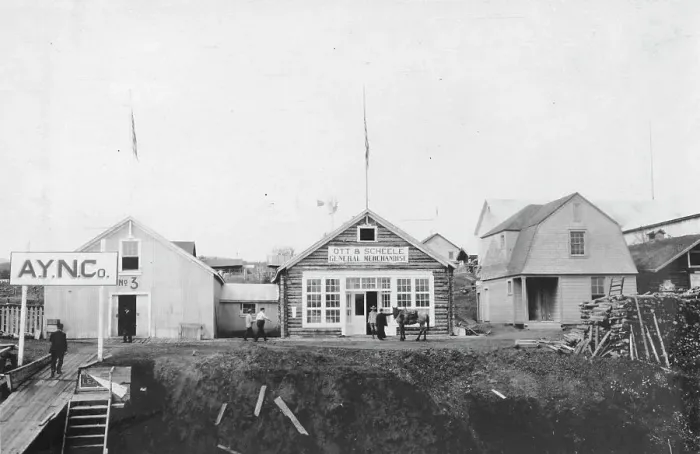 Framed Print : Scene in front of Ott and Scheele's general merchandise store, between c1900 and 1916. Creator: Unknown Framed Print : Scene in front of Ott and Scheele's general merchandise store, between c1900 and 1916. Creator: Unknown