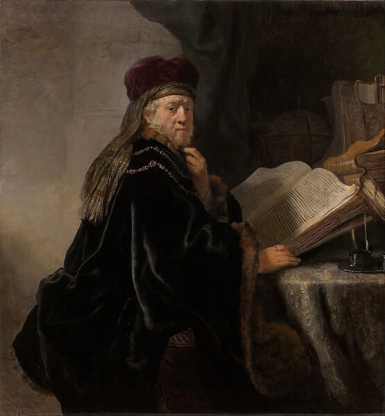 A Scholar Seated at a Desk (Scholar at his Study). Artist: Rembrandt van Rhijn (1606-1669)