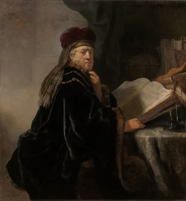 Framed Print : A Scholar Seated at a Desk (Scholar at his Study). Artist: Rembrandt van Rhijn (1606-1669) Framed Print : A Scholar Seated at a Desk (Scholar at his Study). Artist: Rembrandt van Rhijn (1606-1669)