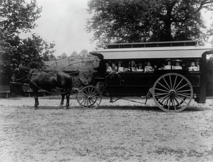 Framed Print : School children of the 6th Division in a horse-drawn car, (1899?). Creator: Frances Benjamin Johnston Framed Print : School children of the 6th Division in a horse-drawn car, (1899?). Creator: Frances Benjamin Johnston
