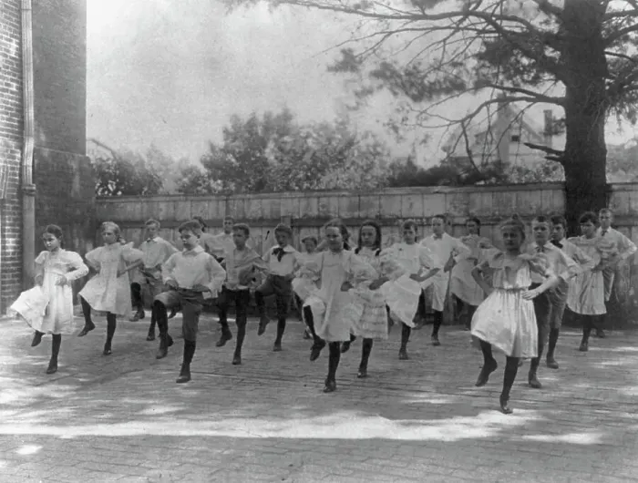 Framed Print : School children learning a dance in a school yard, Washington, D.C. (1899?). Creator: Frances Benjamin Johnston Framed Print : School children learning a dance in a school yard, Washington, D.C. (1899?). Creator: Frances Benjamin Johnston