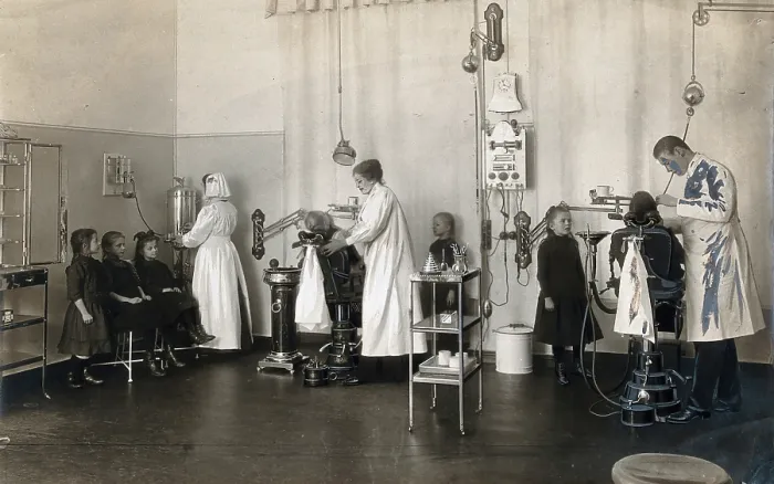 Framed Print : A school-children's dental clinic in Berlin: some children being treated... c1900