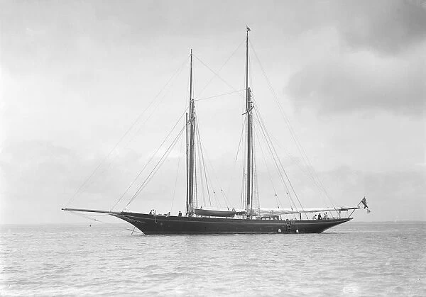 The schooner Allah Karim at anchor, 1912. Creator: Kirk & Sons of Cowes