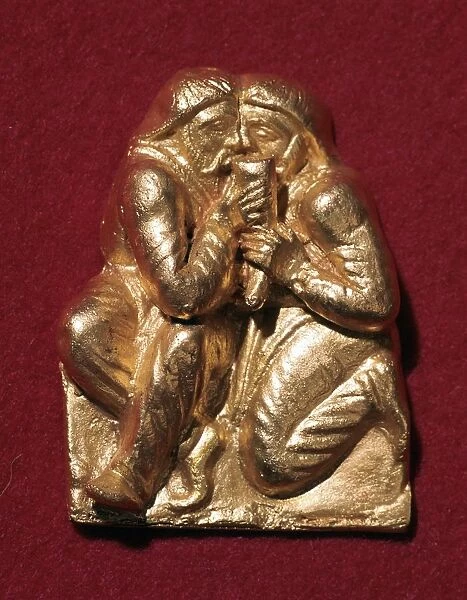 Scythian plaque showing two men drinking from a horn, 4th century BC