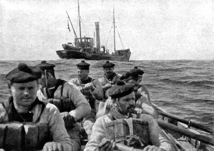 Framed Print : At Sea: The coastguard: boarding crew going aboard a suspect trawler... 1917. Creator: Unknown Framed Print : At Sea: The coastguard: boarding crew going aboard a suspect trawler... 1917. Creator: Unknown
