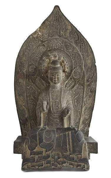 Seated figure of the Buddha Sakyamuni in high relief, Period of Division, 534-550