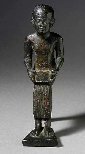 Seated Figure of the God Imhotep Holding a Scroll, 712-332 B.C. or later. Creator: Unknown