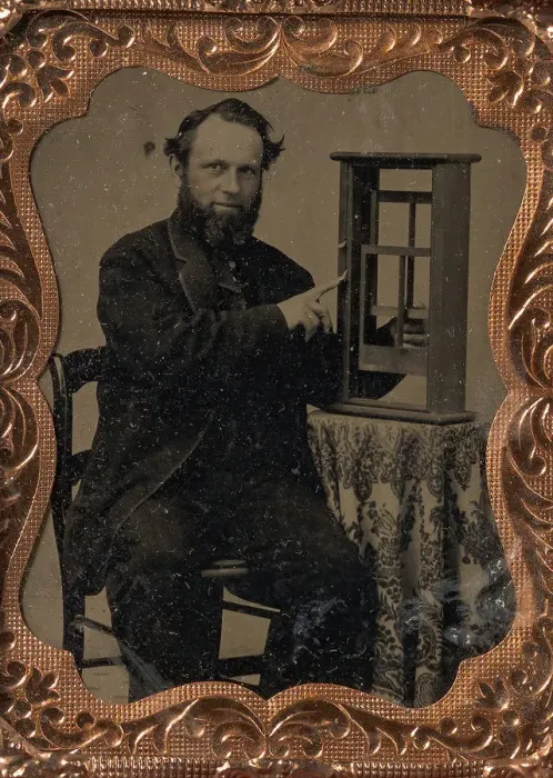 Framed Print : Seated Man Demonstrating Vertical Sliding Window Model, late 1850s-60s. Creator: Unknown Framed Print : Seated Man Demonstrating Vertical Sliding Window Model, late 1850s-60s. Creator: Unknown