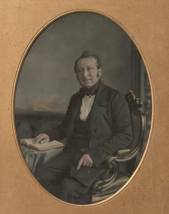 Framed Print : Seated Man Pointing to a Passage in an Open Book, 1850s. Creator: John Jabez Edwin Mayall Framed Print : Seated Man Pointing to a Passage in an Open Book, 1850s. Creator: John Jabez Edwin Mayall