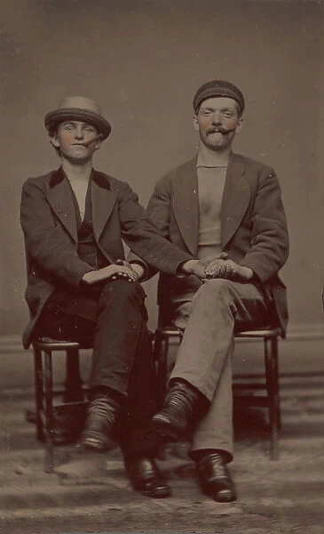Two Seated Young Men Holding Hands, 1880s. Creator: Unknown