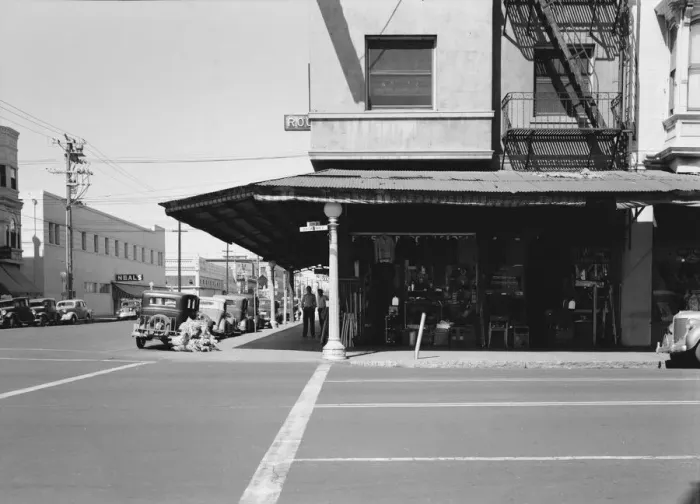 Framed Print : Secondhand store, street corner of San Joaquin Valley town on U. S. 99, Fresno, CA, 1939. Creator: Dorothea Lange Framed Print : Secondhand store, street corner of San Joaquin Valley town on U. S. 99, Fresno, CA, 1939. Creator: Dorothea Lange