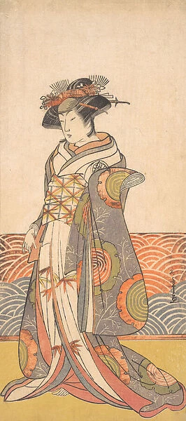 The Third Segawa Kikunojo as a Woman Standing in a Room Having a Wave-pattern Dado, ca. 1779. Creator: Shunsho