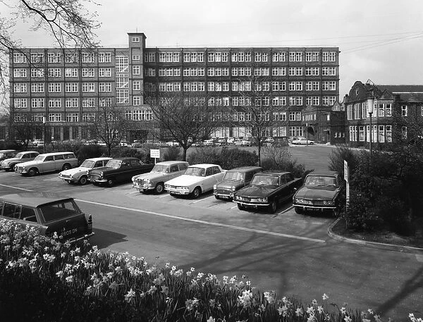 A selection of 1960s cars in a car park, York, North Yorkshire, May 1969. Artist