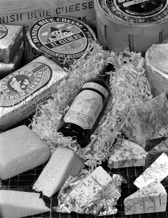 Framed Print : A selection of Danish cheeses and a bottle of Aalborg aquavit, 1963 Framed Print : A selection of Danish cheeses and a bottle of Aalborg aquavit, 1963