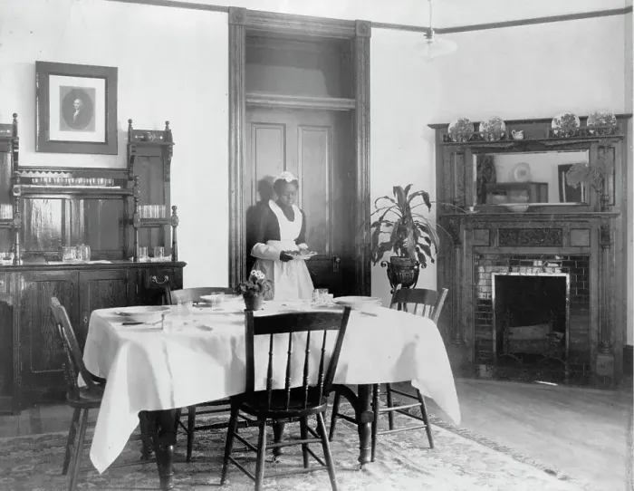 Framed Print : Serving the dinner, 1899 or 1900. Creator: Frances Benjamin Johnston Framed Print : Serving the dinner, 1899 or 1900. Creator: Frances Benjamin Johnston
