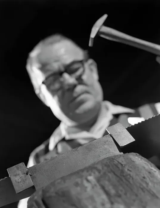 Framed Print : Setting the saw teeth on a hand saw blade, Sheffield, South Yorkshire, 1963. Artist Framed Print : Setting the saw teeth on a hand saw blade, Sheffield, South Yorkshire, 1963. Artist