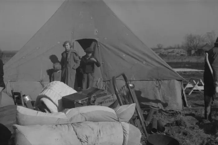 Framed Print : Setting up a tent in the camp for white flood refugees, Forrest City, Arkansas, 1937. Creator: Walker Evans Framed Print : Setting up a tent in the camp for white flood refugees, Forrest City, Arkansas, 1937. Creator: Walker Evans