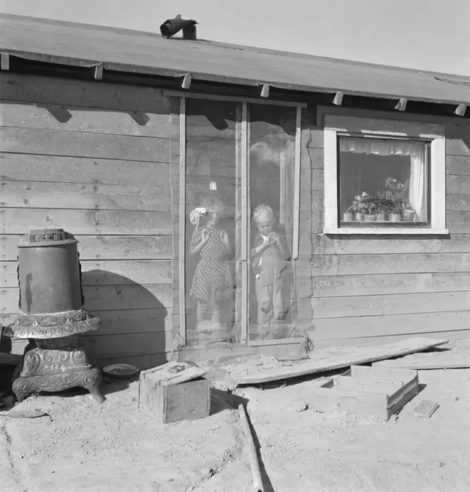 Framed Print : Two of the seven Browning children in doorway of their Oregon home, Dead Ox Flat, Oregon, 1939. Creator: Dorothea Lange Framed Print : Two of the seven Browning children in doorway of their Oregon home, Dead Ox Flat, Oregon, 1939. Creator: Dorothea Lange