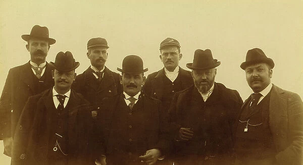 Seven men, half-length portrait, facing front, 1894 or 1895. Creator: Alfred Lee Broadbent