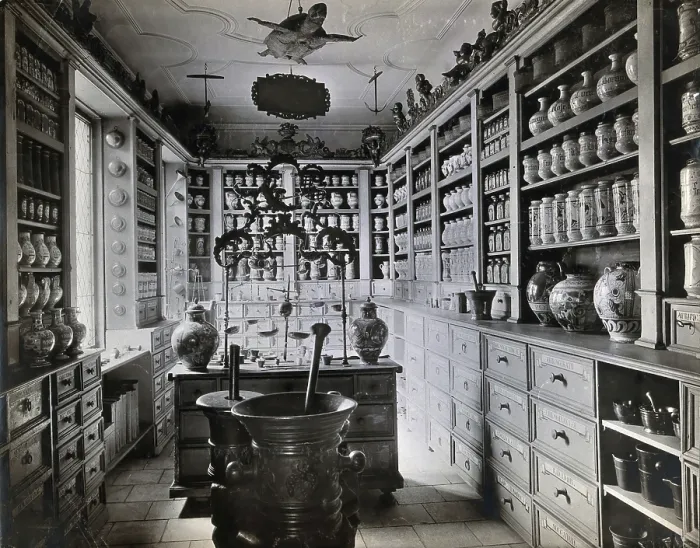 Framed Print : A seventeenth-century German apothecary's shop with ornate pharmacy jars... c1900s Framed Print : A seventeenth-century German apothecary's shop with ornate pharmacy jars... c1900s