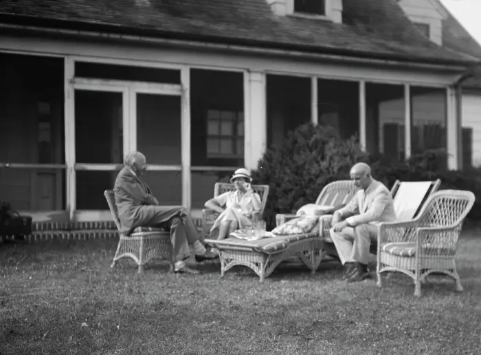 Framed Print : Sexton, Mr. and Mrs. and an unidentified man, seated outdoors, between 1932 and 1936. Creator: Arnold Genthe Framed Print : Sexton, Mr. and Mrs. and an unidentified man, seated outdoors, between 1932 and 1936. Creator: Arnold Genthe