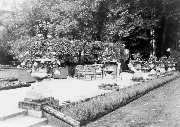 Framed Print : A Shaded gravelled terrace, screened by orange trees, with chaise longues... France, 1925. Creator: Frances Benjamin Johnston Framed Print : A Shaded gravelled terrace, screened by orange trees, with chaise longues... France, 1925. Creator: Frances Benjamin Johnston
