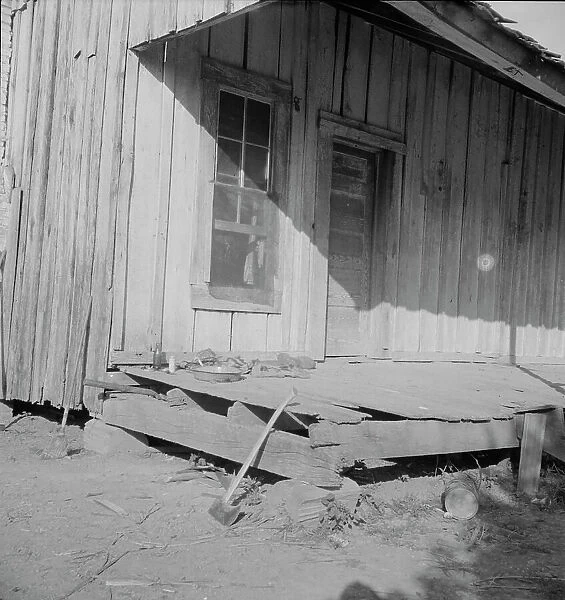 Sharecropper's cabin, Mississippi, 1937. Creator: Dorothea Lange