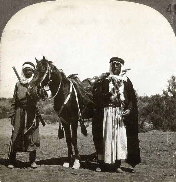 A sheikh and his bodyguard, Syria, 1900s. Artist: Keystone