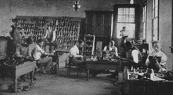 Shoe shop making and repairing, 1904. Creator: Frances Benjamin Johnston