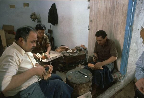 Shoemakers in a Tunisian souk