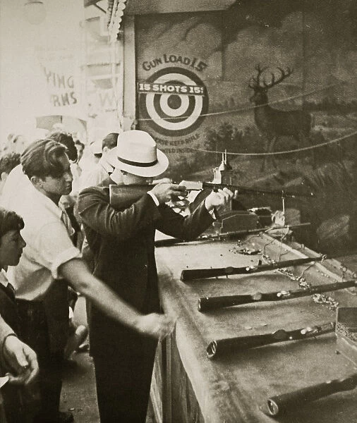 Shooting gallery at the amusement park, Coney Island, New York, USA, early 1930s