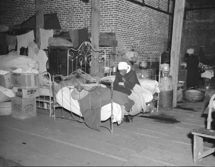 Framed Print : Sick flood refugee in the Red Cross temporary infirmary at Forrest City, Arkansas, 1937. Creator: Walker Evans Framed Print : Sick flood refugee in the Red Cross temporary infirmary at Forrest City, Arkansas, 1937. Creator: Walker Evans