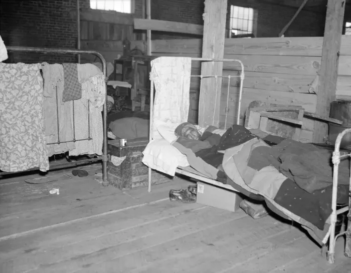 Framed Print : Sick flood refugee in the Red Cross temporary infirmary at Forrest City, Arkansas, 1937. Creator: Walker Evans Framed Print : Sick flood refugee in the Red Cross temporary infirmary at Forrest City, Arkansas, 1937. Creator: Walker Evans