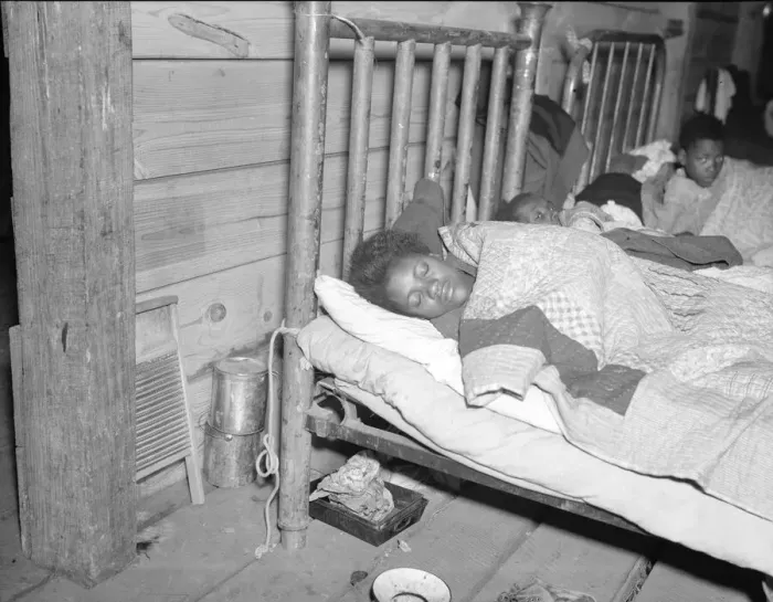Framed Print : Sick flood refugee in the Red Cross temporary infirmary at Forrest City, Arkansas, 1937. Creator: Walker Evans Framed Print : Sick flood refugee in the Red Cross temporary infirmary at Forrest City, Arkansas, 1937. Creator: Walker Evans