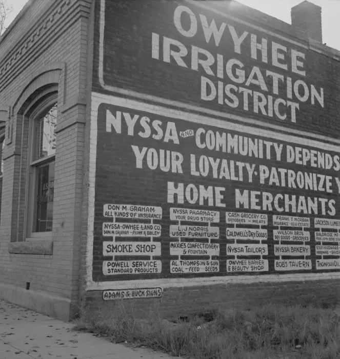Framed Print : Sign on old bank building which now houses office of Bureau... Nyssa, Malheur County, Oregon, 1939. Creator: Dorothea Lange Framed Print : Sign on old bank building which now houses office of Bureau... Nyssa, Malheur County, Oregon, 1939. Creator: Dorothea Lange
