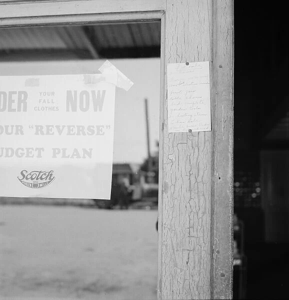 Sign on post office door: Farm animals and household equipment... Vader, western Washington, 1939. Creator: Dorothea Lange